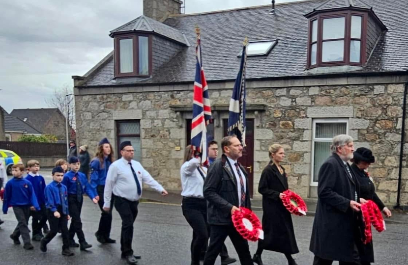 Harriet Cross MP and Douglas Lumsden MSP taking part in parade