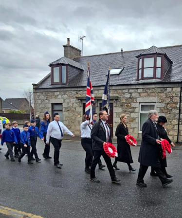 Harriet Cross MP and Douglas Lumsden MSP taking part in parade